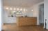 K�che in Olive, Schichtstoff, Kompositstein (silestone) und Edelstahl