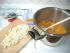 Orangenfilet im Topf, Wei�eschokolade in St�cke, Orangenschale in feine Streifen