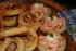 Gef�llte Bl�tterteigschnecken und Crevettenblinis