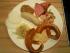 Brotzeit mit Wei�w�rstl, Leberk�s, Wurstsalat, Laugenbrezn, Obatzda, Krautsalat und Radi