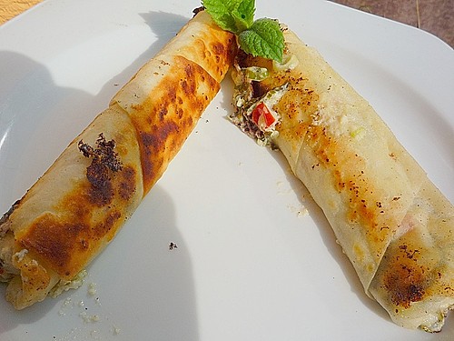 http://cdn.chefkoch.de/ck.de/rezepte/137/137066/172350-big-gefuellte-yufka-teigblaetter-mit-schafskaese.jpg